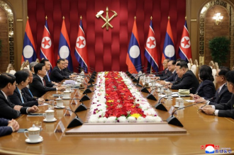 President Thongloun Holds Talks with Kim Jong Un